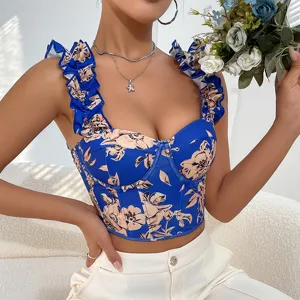 Detailed view of the blue floral corset top featuring delicate ruffles and supportive boning.