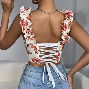 Backless floral crop top with ruffle straps and lace-up back detail for summer fashion.