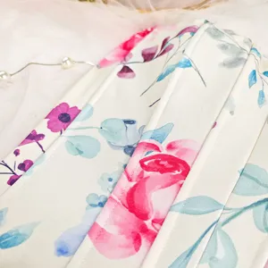 Close-up detail of floral print corset top featuring structured boning and soft fabric.