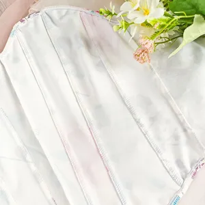 Floral print corset top detail view, structured boning design for a stylish sexy look