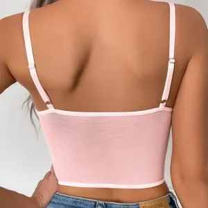 Rosa Mesh-Top Detail, rückenfreies Design mit verstellbaren Trägern für den Sommerstil.
