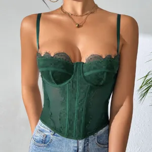 Dark green lace corset top detail showcasing delicate scalloped trim and fishbone support.