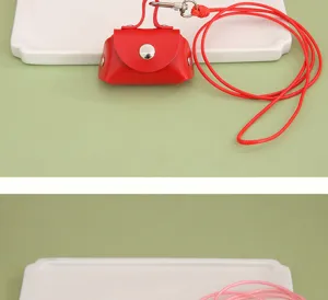 Kleine PU lederen oortelefoon opbergtas met koord, draagbare mini portemonnee en ketting hanger.