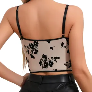 Back view of a beige mesh flocked floral crop top with black straps, chic and stylish.