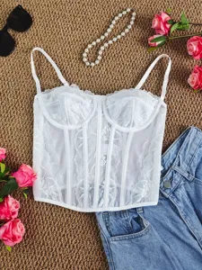 White lace mesh bustier detail, sheer corset top with delicate floral trim and slim straps.