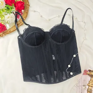 Black lace corset bustier top detail view, featuring sheer mesh panels and supportive cups.