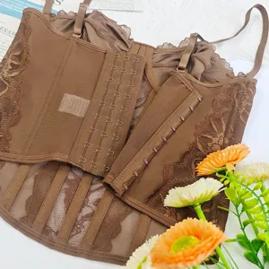 Detailed close-up of brown lace corset bustier top featuring front hook and eye closure.