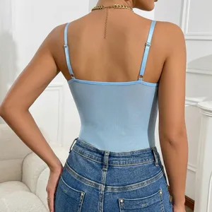 Detail view of a sexy light blue mesh camisole bodysuit with adjustable straps for women.
