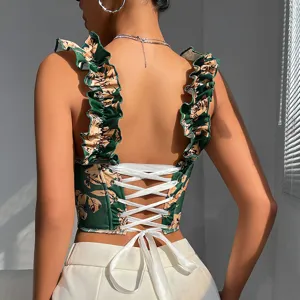 Detailed view of the green floral corset top featuring ruffles and back lace-up ribbons.