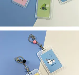 Transparent cartoon card holder keychain detail shot, cute design for student ID and bus pass.