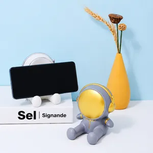 Süßer Astronauten-Telefonständer und Desktop-Ornament, stabiler Harz-Handyhalter für Tischdeko.