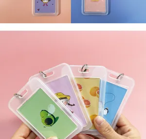 Detailed view of clear transparent card holders with cute cartoon inserts and lanyard ring.