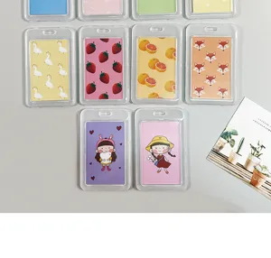 Detailed view of cute cartoon transparent card holders with lovely animal and fruit patterns.