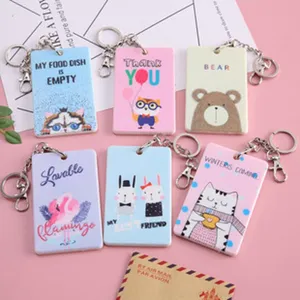 Porte-cartes porte-clés en cuir PU mignon de dessin animé avec imprimés animaux et anneaux.