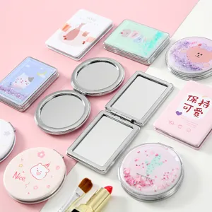 Espejo de maquillaje de bolsillo plegable y lindo con diseño de dibujos animados para uso diario.