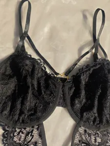 Black lace sheer bodysuit detail, underwire support, delicate floral lace and delicate straps.