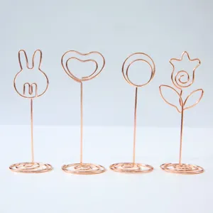 Conjunto creativo y bonito de soporte de notas y clip de foto de alambre metálico.
