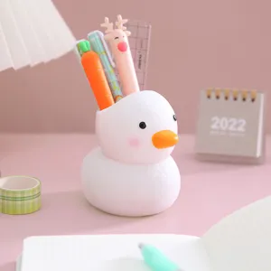 Cute duck pen holder for desktop storage, shatter-resistant vinyl material, pink aesthetic.