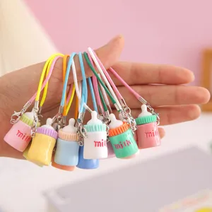 Lindo mini llavero biberón de leche cordón colorido colgante de bolso encantador
