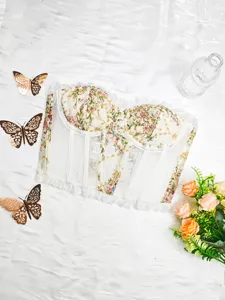 Bloemen kanten corset top met bloemenprint, delicate kanten rand en balein structuur details.