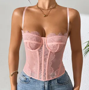 Detailed view of pink sheer lace corset top with fishbone support and delicate eyelash trim.