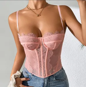Pink sheer lace corset top with boned bustier design and eyelash trim for women.