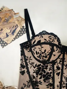 Sexy black and nude lace corset bustier top with floral pattern, underwire and boning.