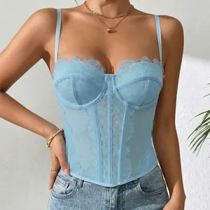 Close-up of sexy blue lace corset top with boning structure and delicate eyelash trim.