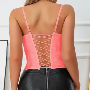 Detailed view of neon pink lace-up corset top with cross straps and back boned design.