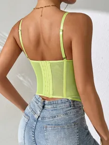 Back view detail of neon green sheer mesh corset top with adjustable straps and hook.