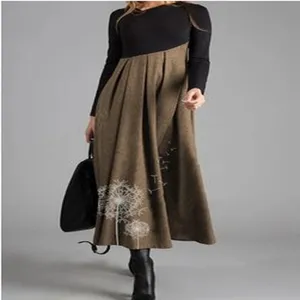 Detailed view of the women's color-contrast splicing dress with exquisite dandelion print.