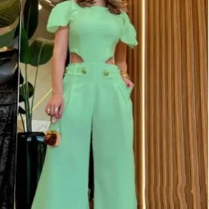 Green summer fashion casual cutout short sleeve top wide leg pants set for women.