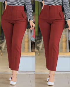 Wine red high-waisted slim-fit suit trousers, elegant cropped office pants detail view.