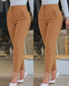 High-waisted slim fit suit trousers detail view, casual commuting cropped pants design.