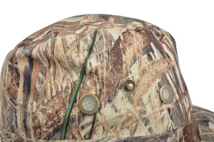 Detailed view of the outdoor camo bucket hat showing marsh grass pattern and metal eyelets.
