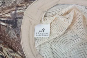 Close up detail of the camouflage fishing sun hat interior lining with breathable mesh and tag.