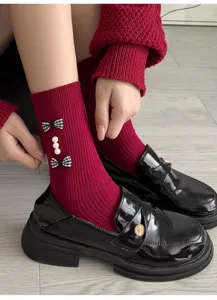 Sweet red knit socks with plaid bows and pearls, cute student style matching loafers.