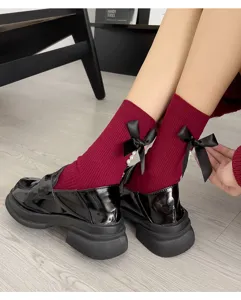 Women autumn winter mid-tube socks with cute back bow and pearl decoration for daily wear.