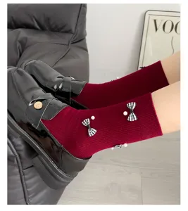 Sweet wine red mid-calf socks featuring chic plaid bows and elegant pearl details for shoes.