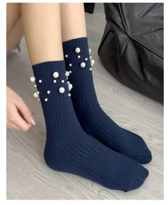 Women dark blue mid-tube cotton socks featuring elegant white pearl embellishments for daily wear.