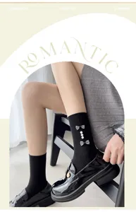Sweet plaid bow pearl mid-calf socks for women, versatile college style socks paired with shoes.