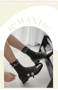 Women pearl decorated ribbed mid-tube socks with elegant Mary Jane block heel shoes.