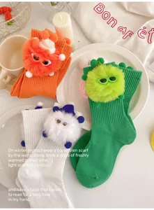Cute fuzzy monster plush design children middle tube socks cozy knit autumn wear detail view