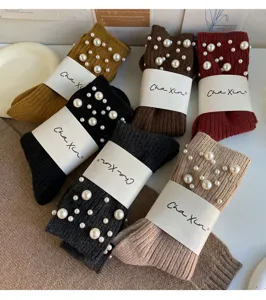 Chic pearl studded warm mid-tube stack socks for women, thick autumn and winter fashion hosiery.