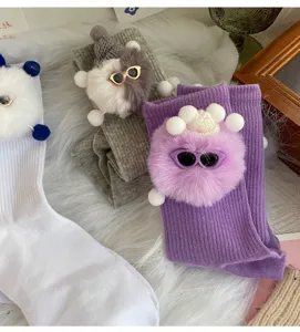 Cute plush doll mid-calf socks for women, stylish cartoon fluffy ball design cozy casual socks.