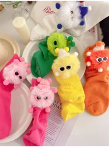 Cute fluffy monster socks for kids, stylish mid-calf socks featuring cute plush doll and sunglasses.