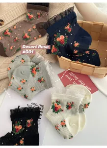 Detailed shot of vintage floral sheer crystal socks with delicate lace frill trim design.
