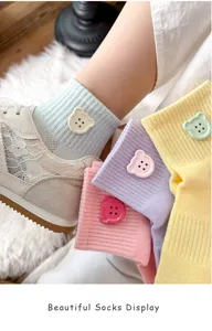 Detailed shot of cute dopamine bear button mesh short socks, breathable cotton material.