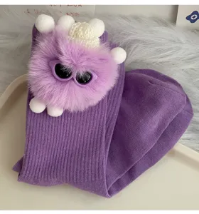 Cute purple mid-calf socks for women featuring 3D fluffy doll pendant and funny sunglasses.