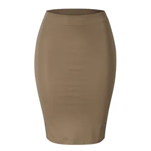 Close-up detail of the slim fit bodycon midi skirt in solid khaki color, elegant and clean.